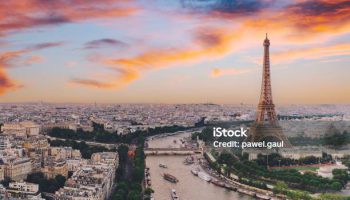 Aerial of Paris city with Seine river during sunset France