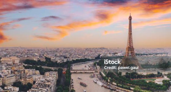 Aerial of Paris city with Seine river during sunset France