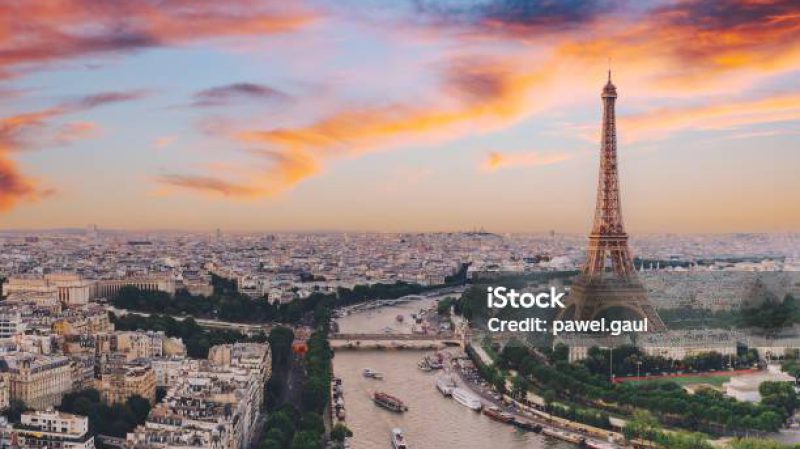 Aerial of Paris city with Seine river during sunset France